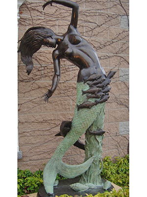 Bronze Mermaid Swimming with the Fish