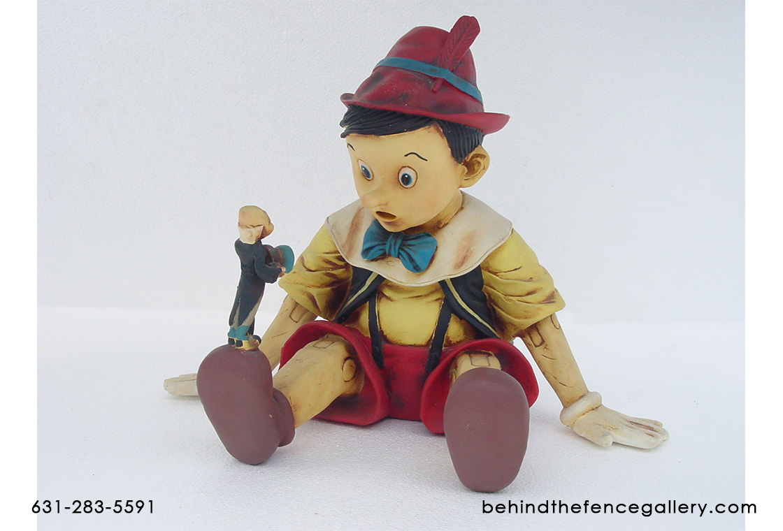 Pinocchio Sitting Statue - Click Image to Close